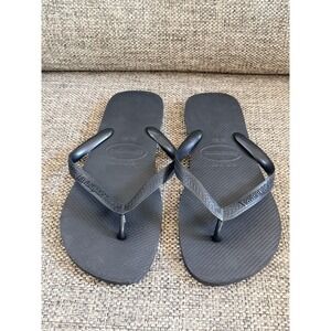 HAVAIANAS black Rubber Slip On Flat Flip Flop Sandals. 13